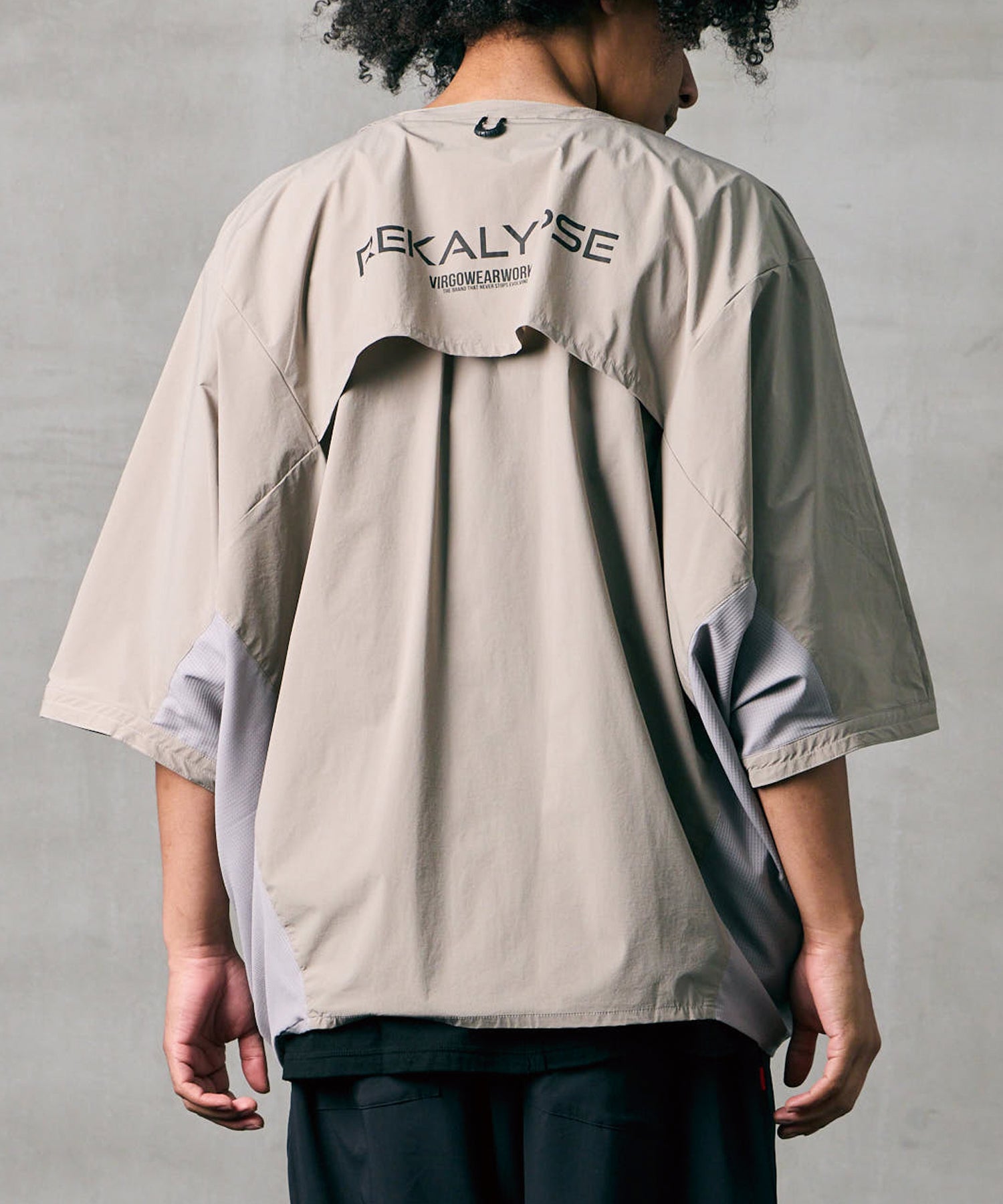DYNAMIC DOLMAN SNAP SHIRT