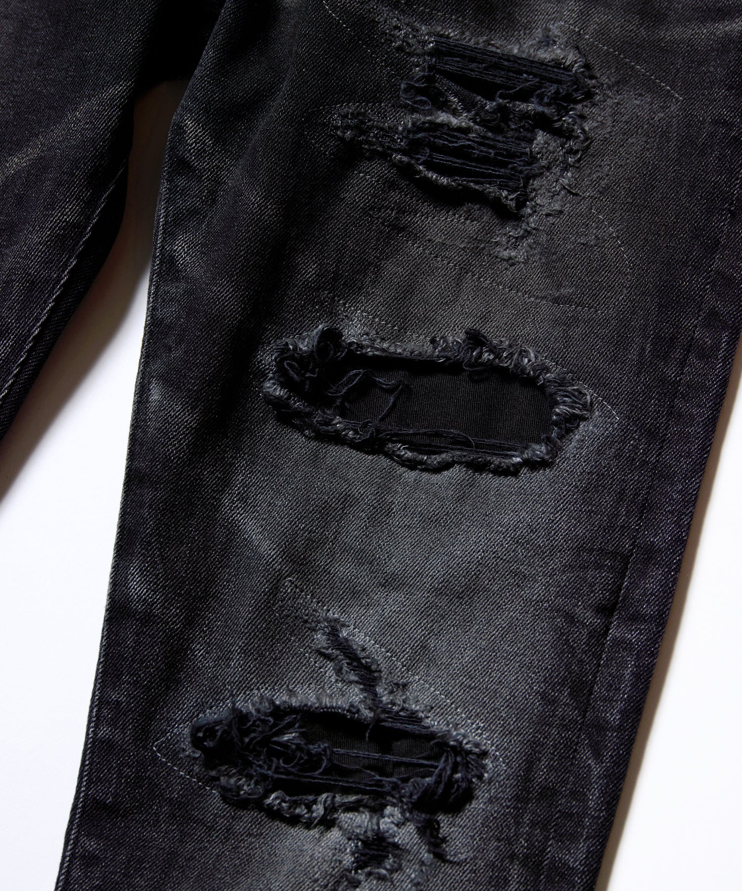DAMAGE DENIM
