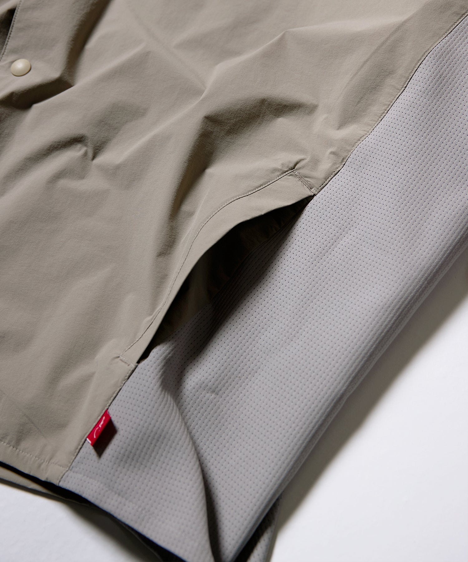 DYNAMIC DOLMAN SNAP SHIRT