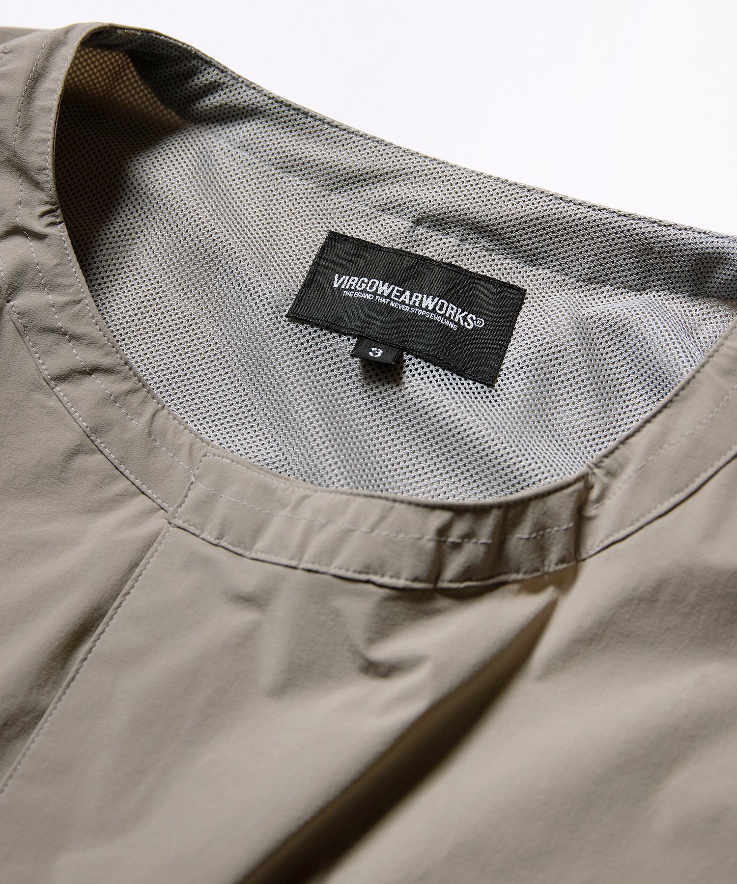 DYNAMIC DOLMAN SNAP SHIRT